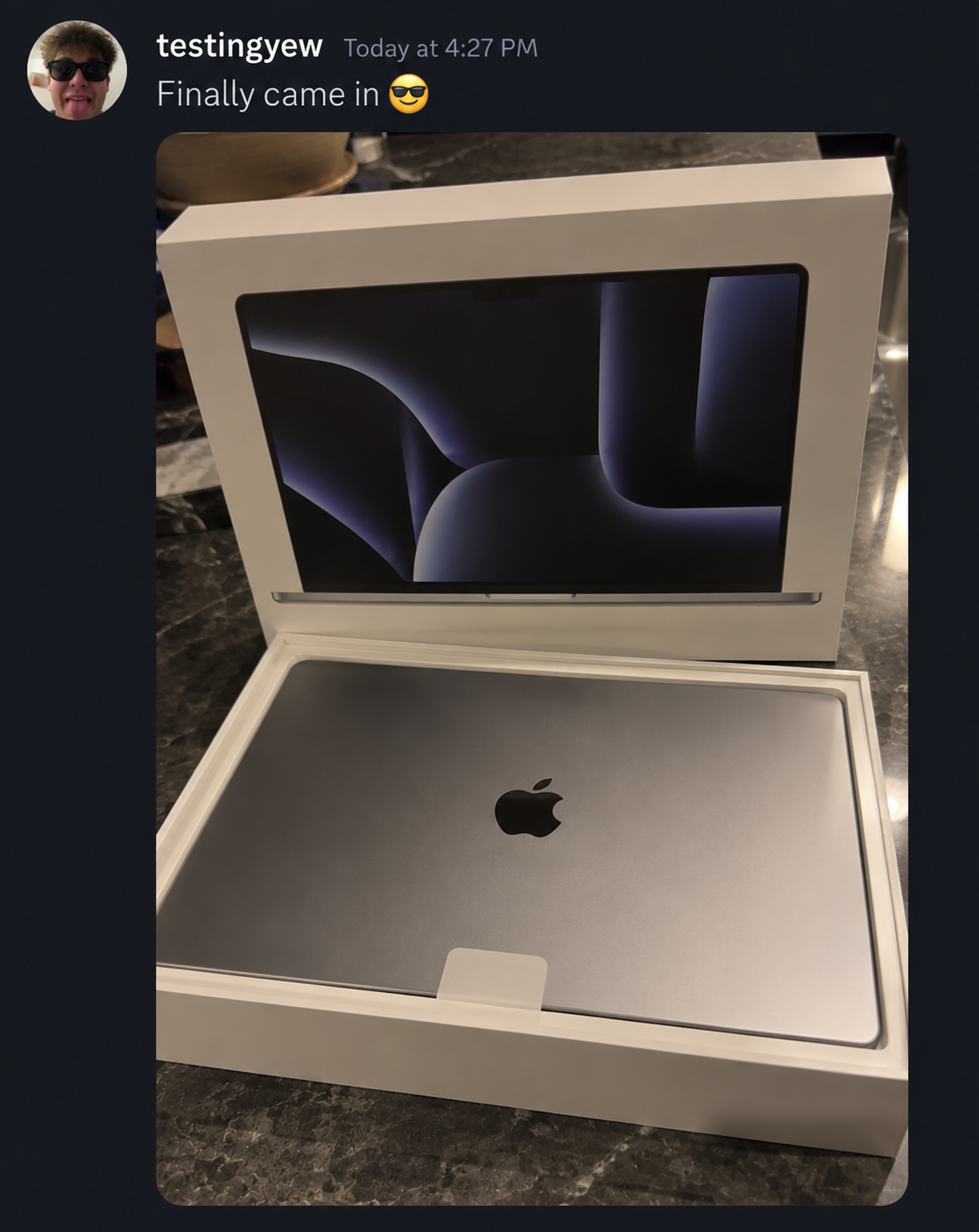 Member-shared laptop photo and message